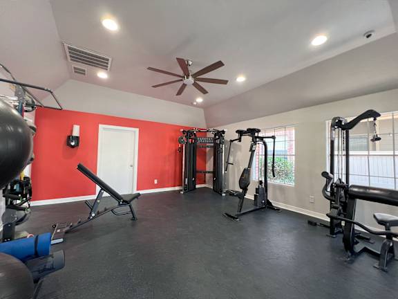Fitness center with strength training equipment at Altamonte Apartments, San Antonio, Texas