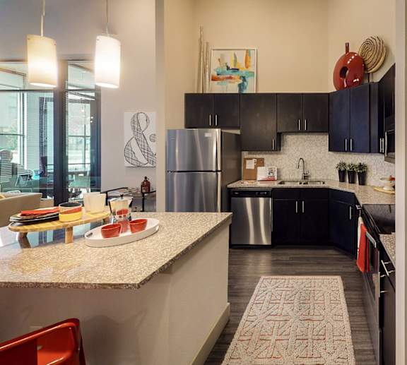 Fully Furnished Kitchen With Stainless Steel Appliances at Civic at Frisco Square Apartments, Frisco, TX