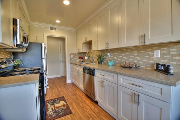 modern kitchen with stainless steel appliances  at Californian, Mountain View, CA, 94040