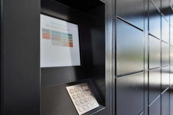 Black machine with screen and a keypad at Renaissance Square, Concord, CA