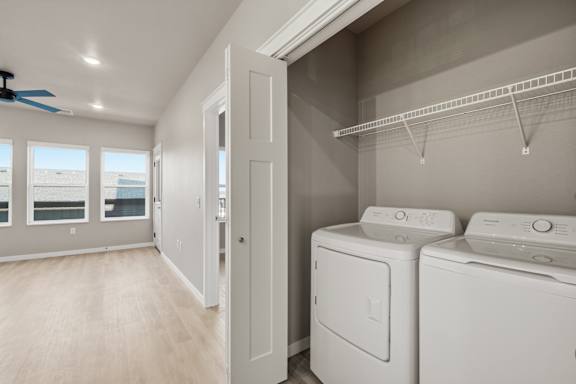 A laundry room with a washer and dryer.