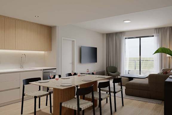 A modern dining room with a wooden table and chairs.