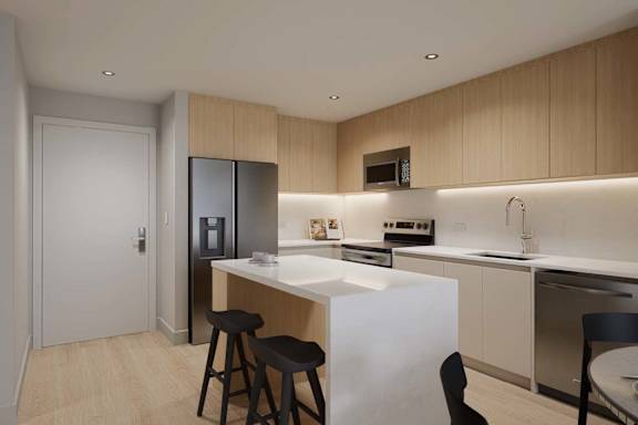 A modern kitchen with a white countertop and black bar stools.