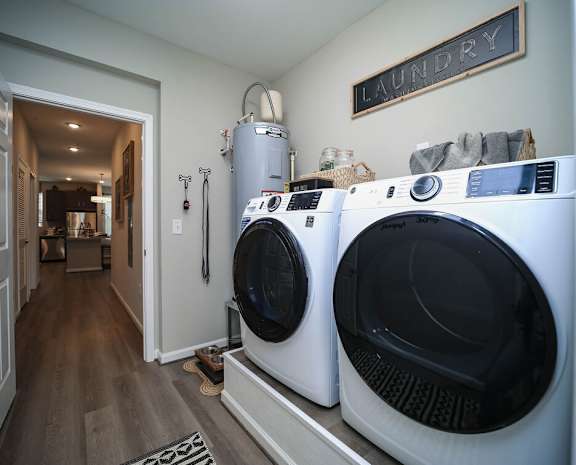 A laundry room with a washer and dryer.