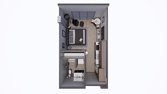 A small room with a bed, desk, and chair.