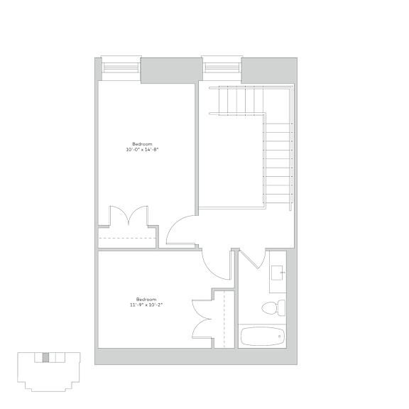 A floor plan of a room with a bedroom and a living room.