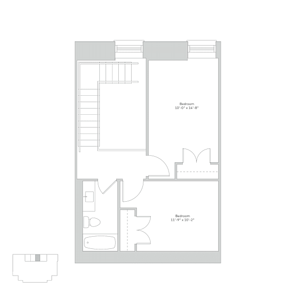 A floor plan of a room with a bedroom and a bathroom.