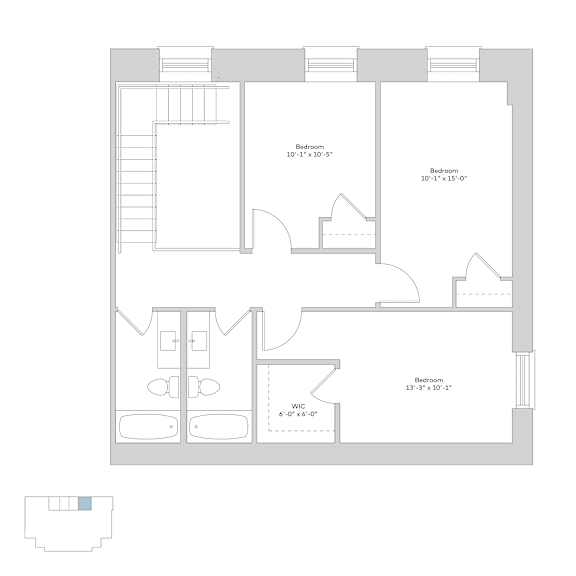 A floor plan of a house with three bedrooms and a living area with a kitchen.