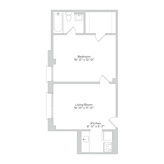 A floor plan of a small apartment with a bedroom, living room, and kitchen.