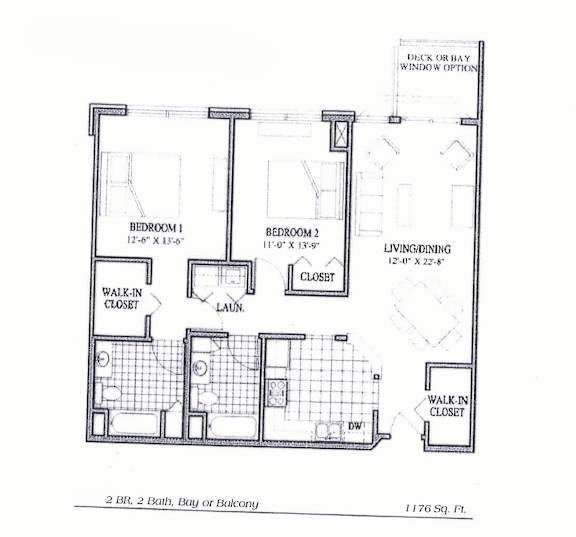 A floor plan of a 2 bedroom, 2 bath house with a living room and two walk-in closets.