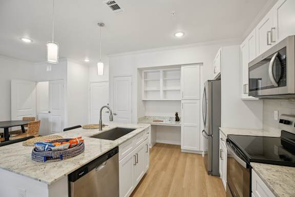 Kitchen with cabinets at Harrisburg Lofts, Texas, 77003