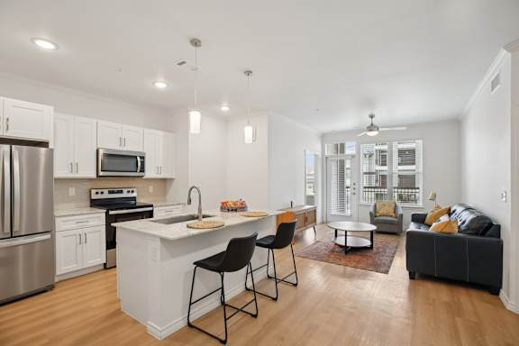 Kitchen with island at Harrisburg Lofts, Texas