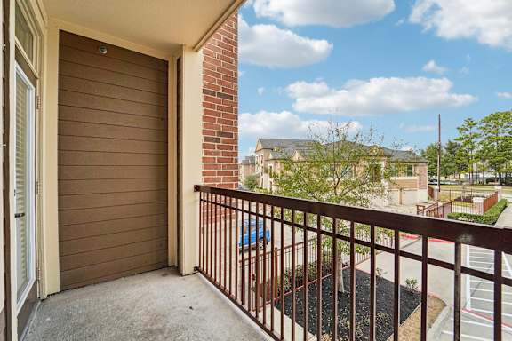 Balcony with railing at Kings Landing, Kingwood, 77339