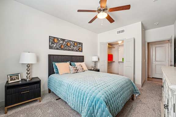 Bedroom with large bed at Kings Landing, Kingwood, Texas