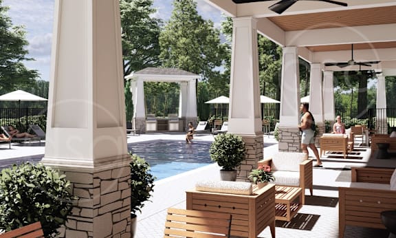 A pool area with people relaxing and a gazebo.