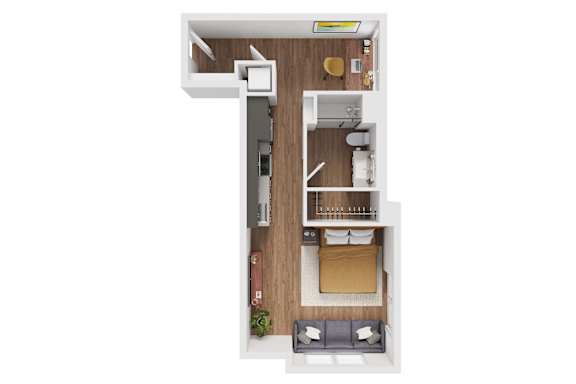 A top down view of a small apartment with a bedroom, living room, and kitchen.