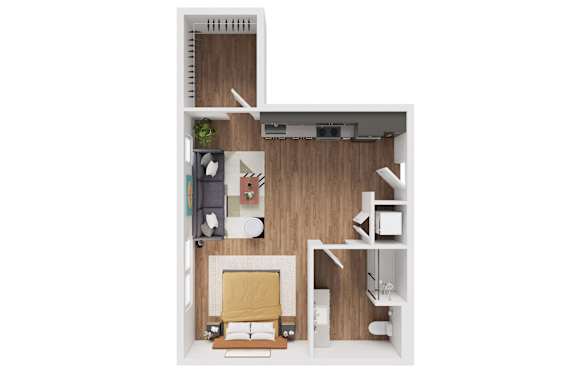 A small room with a bed, chair, and a desk.