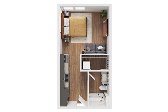 A small room with a bed, desk, and chair.