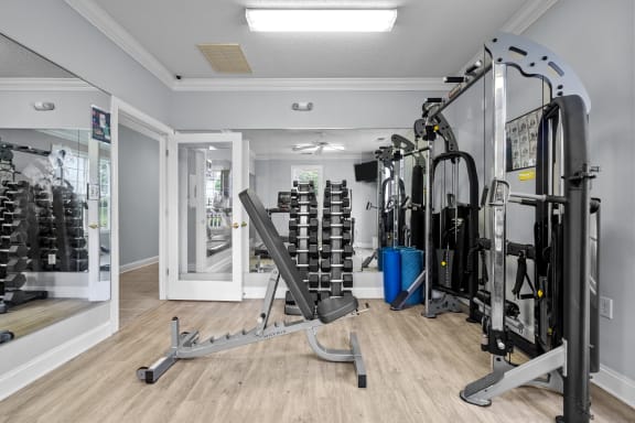Weight Training and Fitness Room at Granville Oaks Apartment Homes, Creedmoor, NC 27522