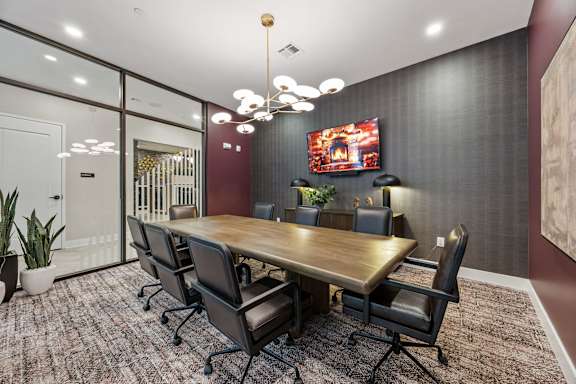 A conference room with a large table and chairs.at Adler Montford Park + Drexel Townes, North Carolina, 28209