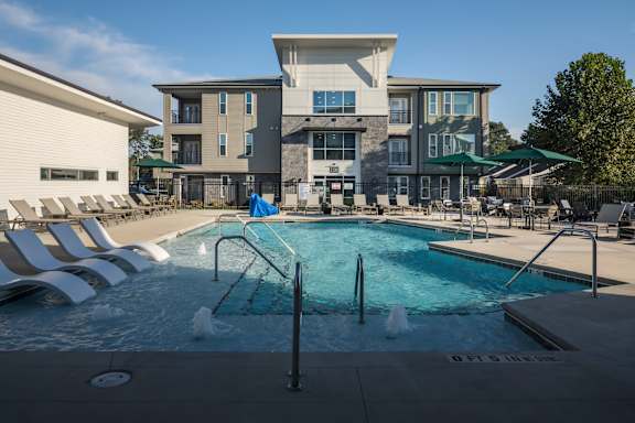 Swimming Pool With Relaxing Chairs at Address East End, Raleigh, NC