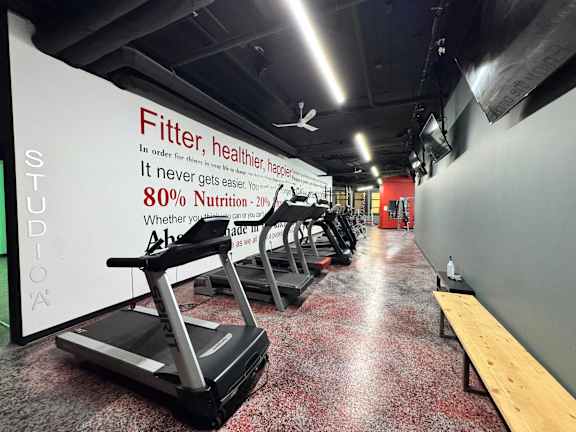 Gym with cardio machines at Sage Hill Views