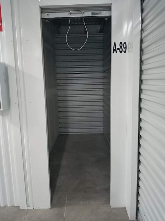 A storage unit with the label A-89 on the door.