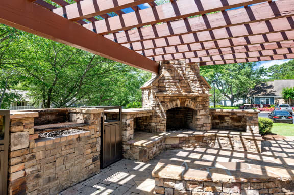 Outdoor Lounge with Fireplace and Grill