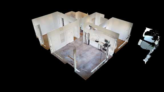 A 3D image of a house with a kitchen and living room.