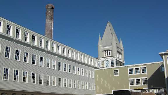 Historic mill building with chimney at Bostonian Shoe Lofts Apartments, Massachusetts, 02382