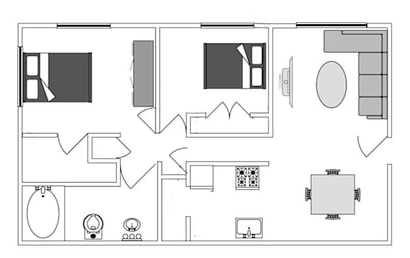 A floor plan of a house with a kitchen, living room, and bathroom.