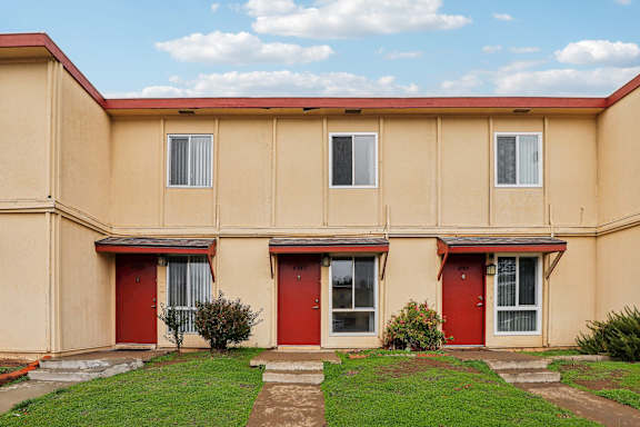 A building with red doors and windows.