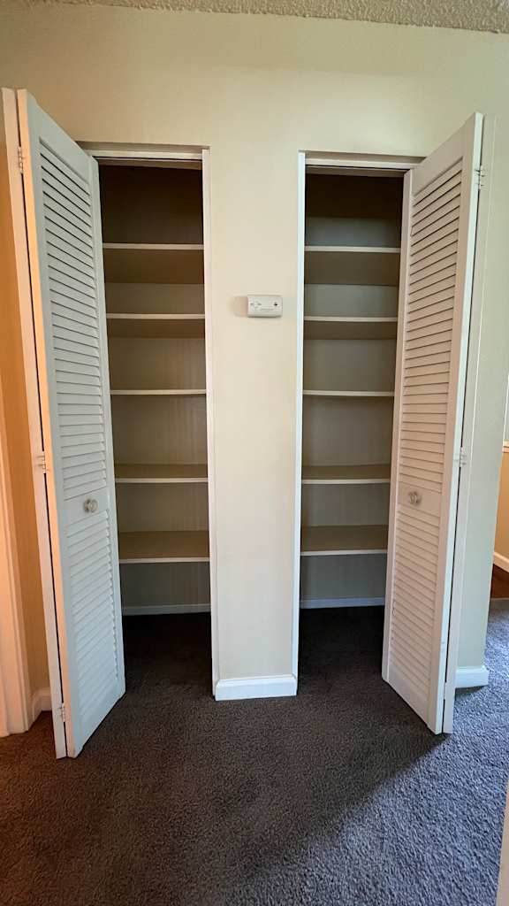 White closet with shelves at Vacaville Park Apartments, Vacaville, CA, California , 95687
