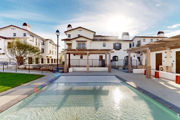 a large swimming pool in front of a house at The Villas at Anacapa Canyon, California, 93012