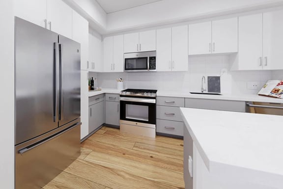 a kitchen with white cabinets and stainless steel appliances at Anacapa Canyon, Camarillo, 93012