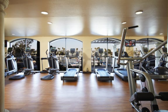 a gym with cardio equipment and a view of the city  at Marina Harbor, Marina del Rey, CA, 90292