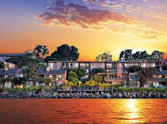 a group of houses on the water at sunset at Mariners Village, Marina del Rey, 90292