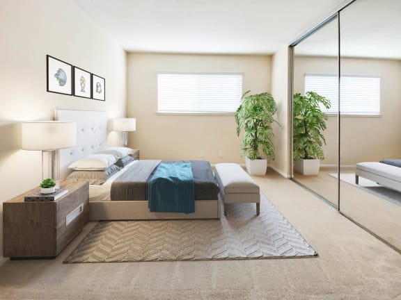 a bedroom with a bed and a mirror  at Pleasanton Place, California