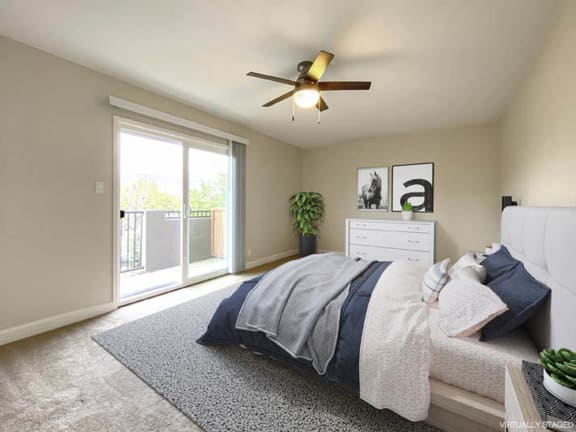 a bedroom with a bed and a ceiling fan at Pleasanton Heights, Pleasanton, CA