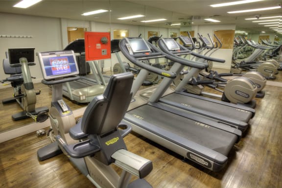 a state of the art gym with cardio equipment and weights  at Sunset Barrington Gardens, Los Angeles, CA