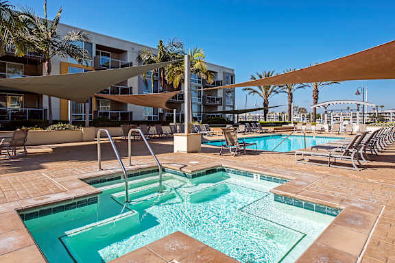 A swimming pool with a slide in the middle of it at Marina Harbor, Marina del Rey, California