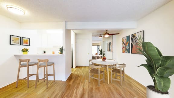 an open dining room and kitchen with a table and chairs at Village Pointe Apartments, Northridge, 91325