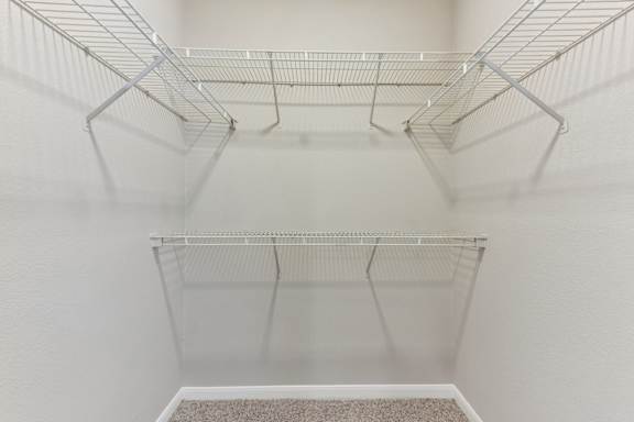 Closet With Shelves at Sonterra Apartment Homes, Austin, Texas