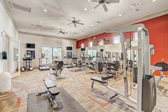 our state of the art gym is equipped with a variety of weights and cardio equipment  at Adiamo Palm Valley, Goodyear, AZ