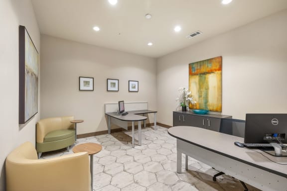 an office with a desk and chairs and a computer at Lakeline East Apartments, Texas, 78613