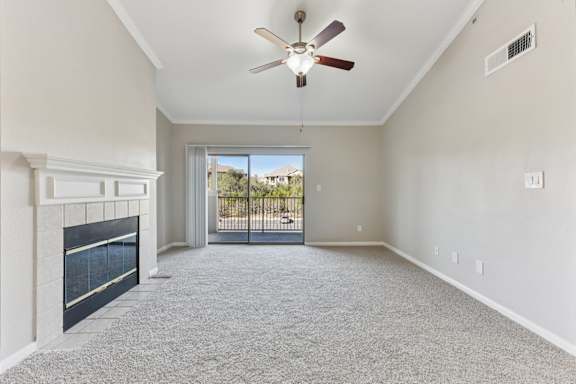 A spacious room with a fireplace and a ceiling fan. at Sonterra Apartment Homes, Austin