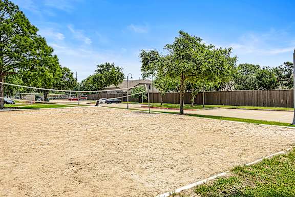 a volleyball court at Artisan Apartments & Shops, Austin, Texas