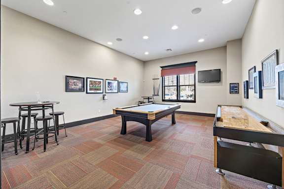 our apartments have a game room with a foosball table and a ping pong table at Las Brisas Apartment Homes, Round Rock, 78665