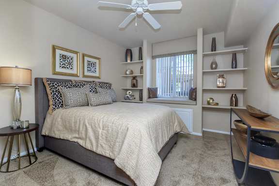 a bedroom with a bed and a ceiling fan at The Covington by Picerne, Nevada, 89139