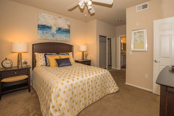 a bedroom with a bed and a ceiling fan at The Aliante by Picerne, Scottsdale, AZ 85259